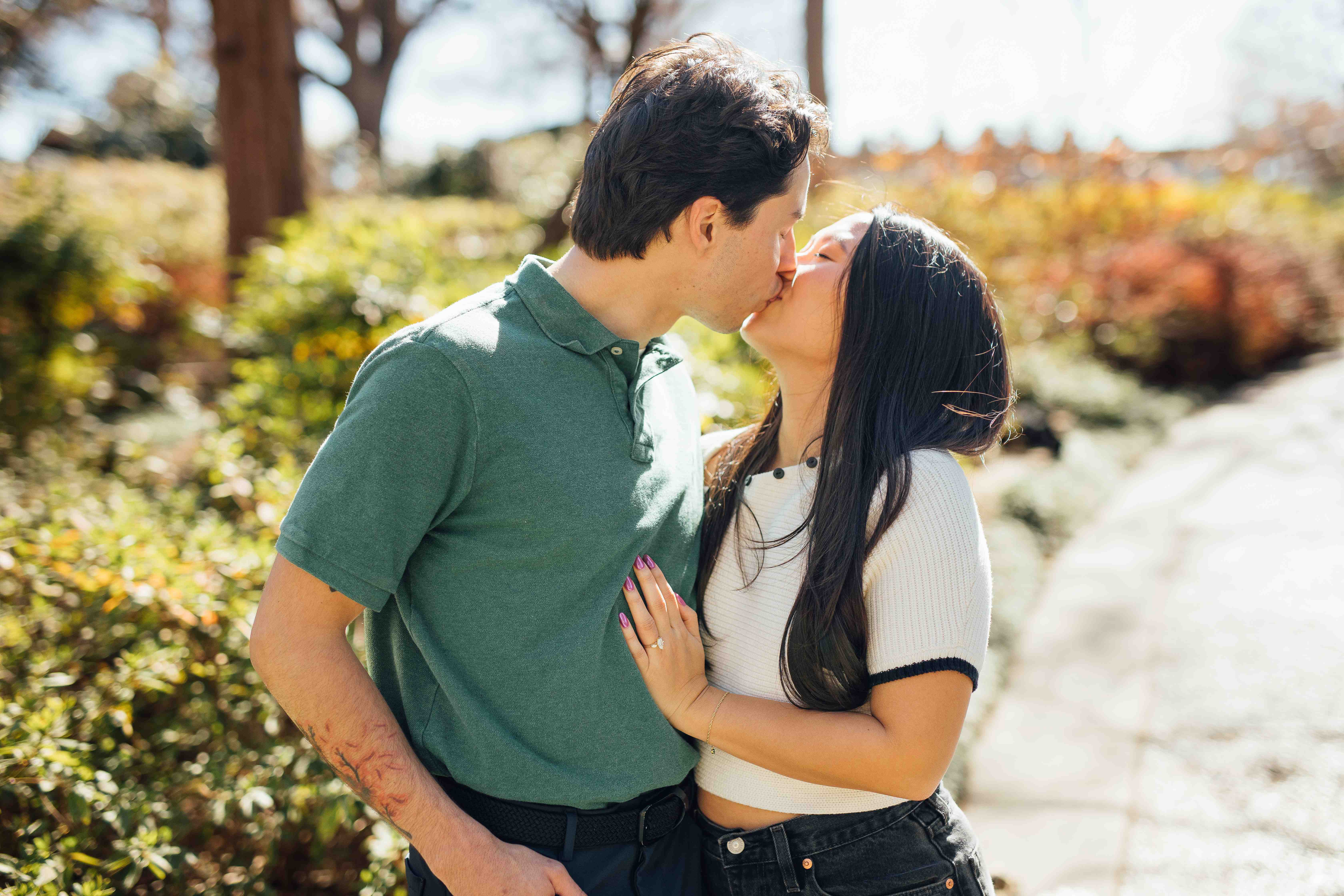 Emily and Matthew sharing a kiss