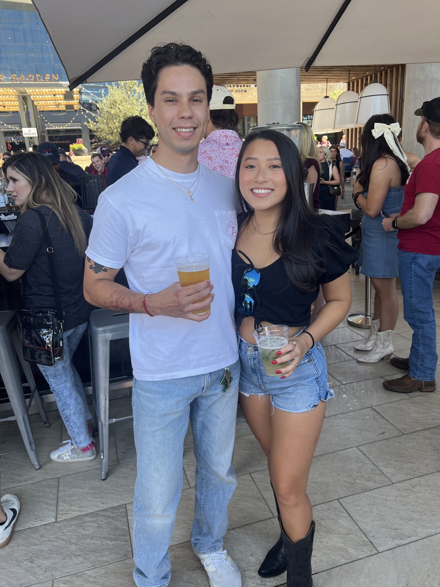 Emily and Matthew enjoying football season at a Dallas entertainment venue